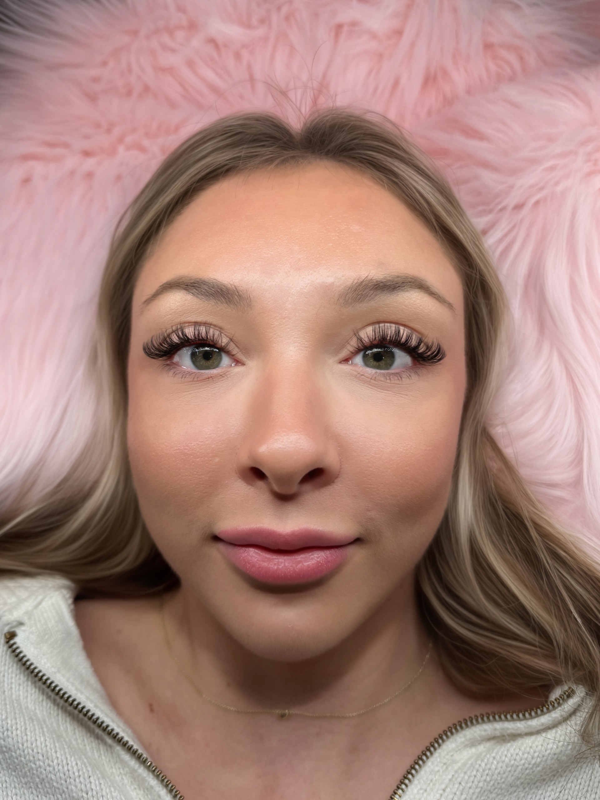 Medium-length Wet Set lash extensions on blonde client