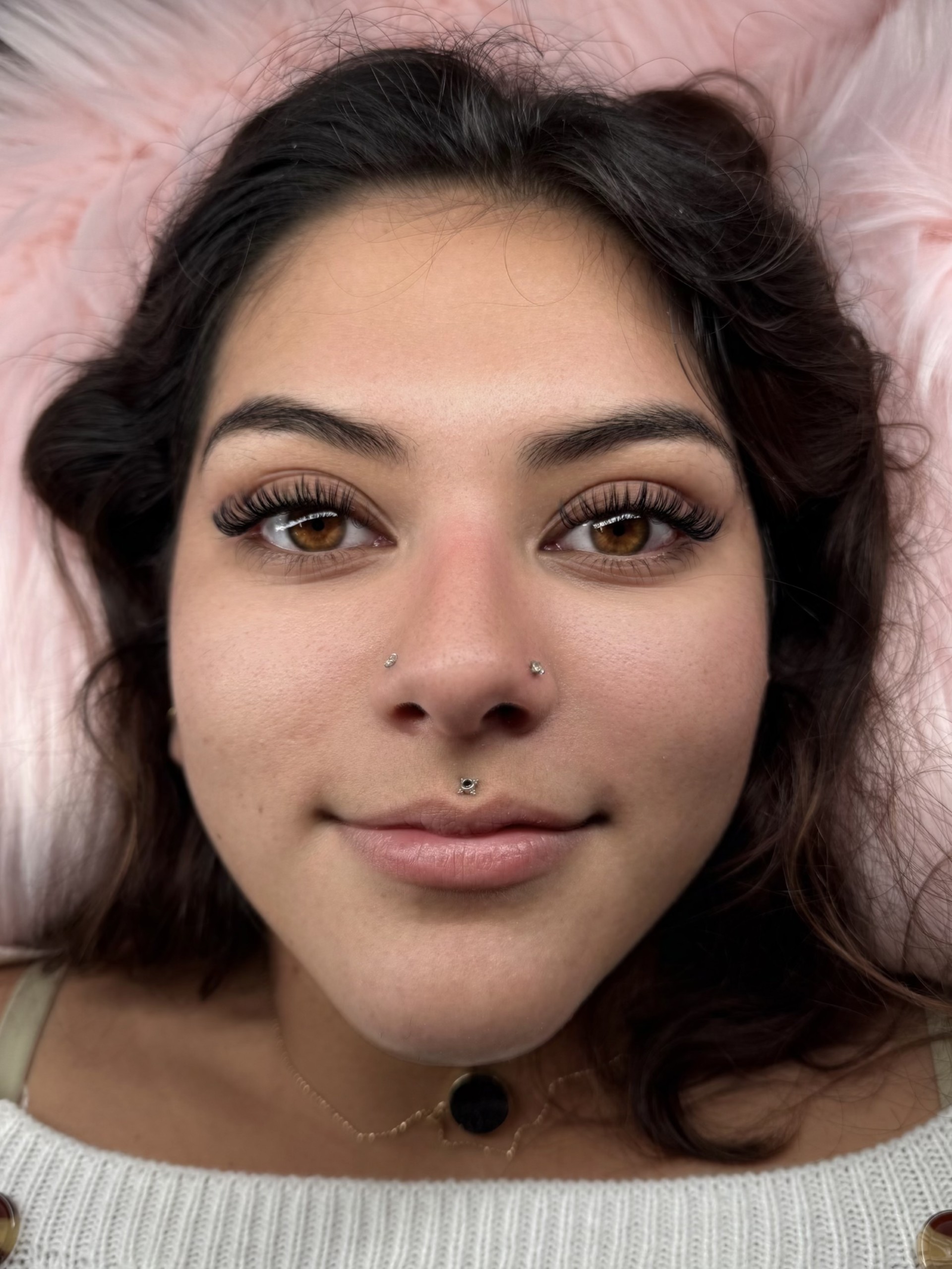 Wet Set lash extensions on brunette client
